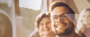 student smiling in classroom